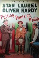 给菲利普穿上裤子